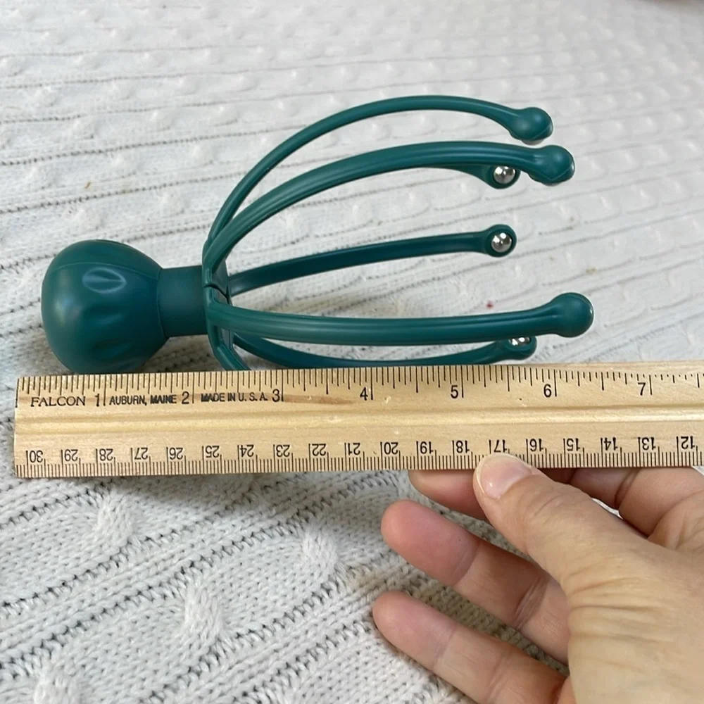 Scalp massager gently massages pressure points and sensitive nerves on head/neck